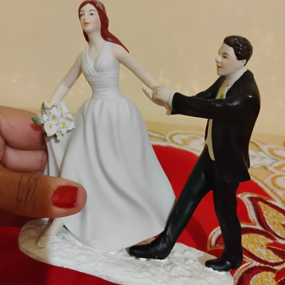 Elegant Wedding Cake Topper with Bride and Groom